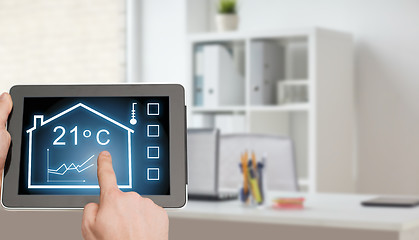 Image showing tablet pc with smart home settings on screen