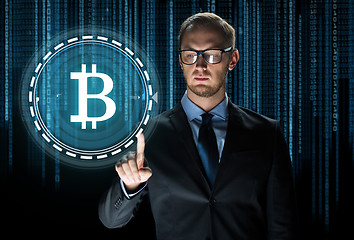 Image showing close up of businessman with bitcoin hologram