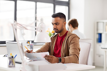 Image showing indian man with laptop computer at office