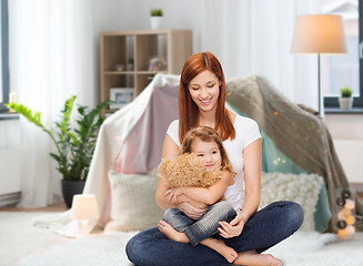 Image showing happy mother with adorable girl and teddy bear