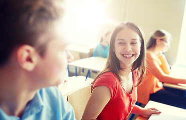 Image showing group of happy students talking at school break