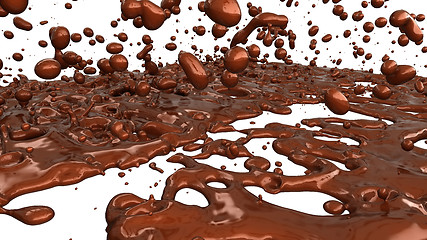 Image showing Melting chocolate or cocoa coffee splashes and droplets