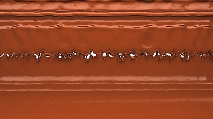 Image showing Melting chocolate or cocoa coffee splashes and droplets