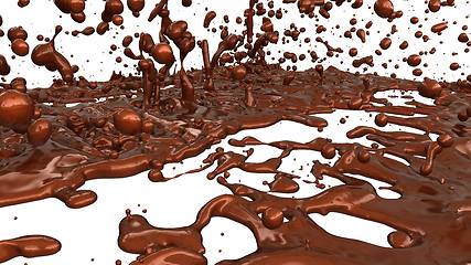 Image showing Melted chocolate or cocoa coffee splashes and droplets