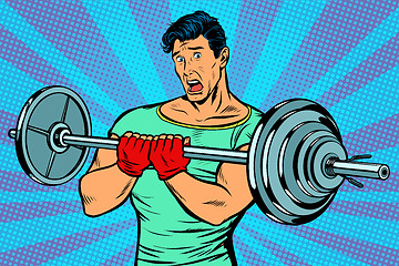 Image showing shocked man with a barbell in the gym