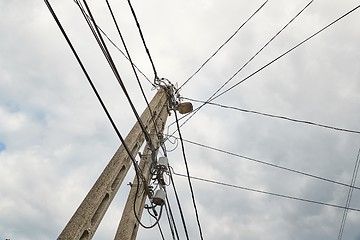 Image showing Electric lines on wooden post