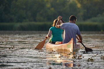 Image showing Canoe tour on a river