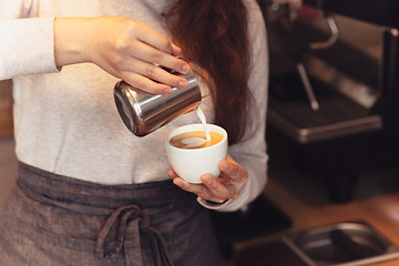 Image showing Barista, cafe, making coffee, preparation and service concept