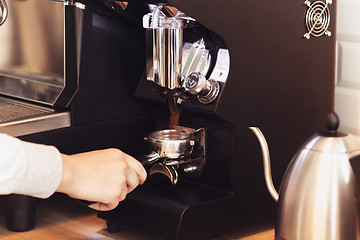 Image showing Barista, cafe, making coffee, preparation and service concept