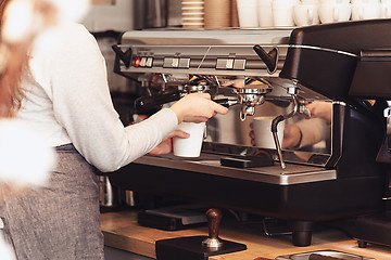 Image showing Barista, cafe, making coffee, preparation and service concept