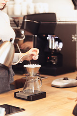 Image showing Barista, cafe, making coffee, preparation and service concept