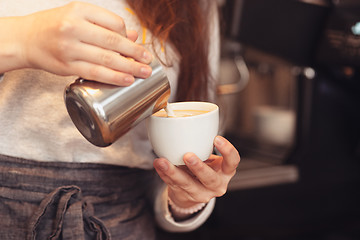 Image showing Barista, cafe, making coffee, preparation and service concept