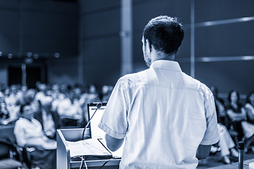 Image showing Public speaker giving talk at Business Event.