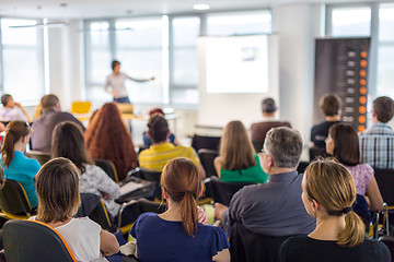 Image showing Speaker giving presentation on business conference.