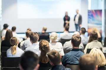 Image showing Business speakers giving a talk at business conference event.