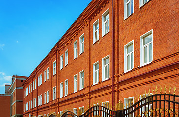 Image showing Old Reconstructed Red Brick Building Under Blue Sky