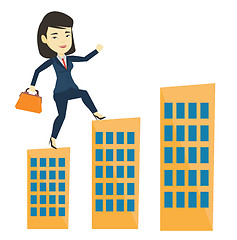 Image showing Business woman walking on the roofs of buildings.