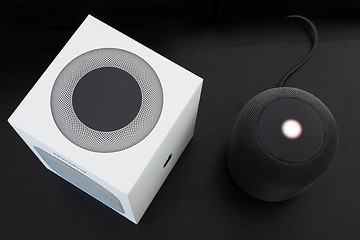 Image showing Unboxing an Apple HomePod speaker