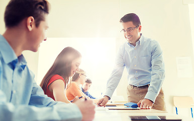 Image showing group of students and teacher at school classroom