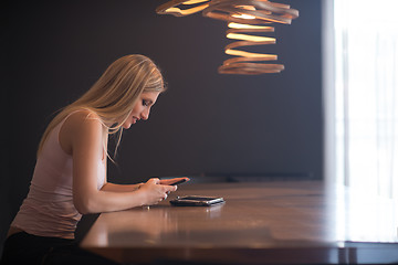 Image showing young woman using mobile phone