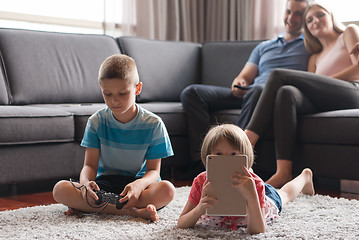 Image showing couple spending time with kids