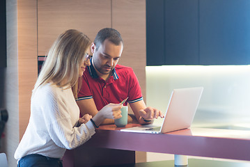 Image showing happy young couple buying online