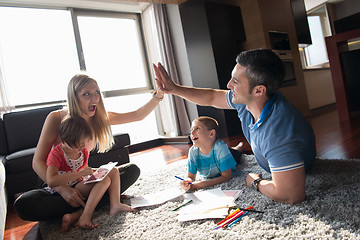 Image showing young couple spending time with kids