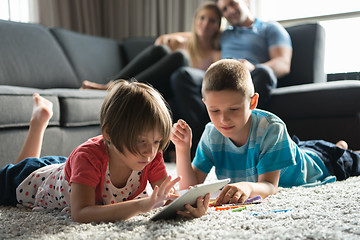 Image showing young couple spending time with kids