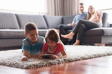 Image showing couple spending time with kids