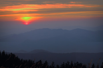 Image showing beautiful orange sunset over the mountains 