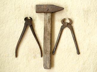 Image showing old hammer and two old nippers