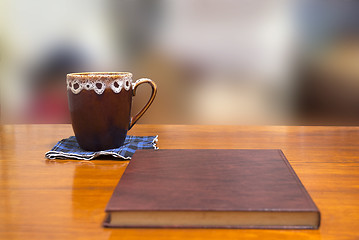 Image showing book and cup