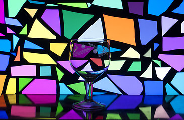 Image showing glass wine glass on the background of abstraction