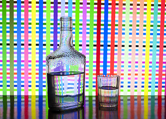 Image showing Glass bottle of vodka and glasses