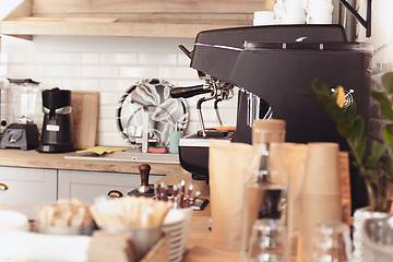 Image showing A table setting for coffee on the counter at a coffee house