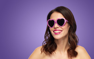 Image showing woman with heart shaped shades over ultra violet