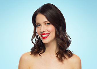 Image showing beautiful smiling young woman with red lipstick