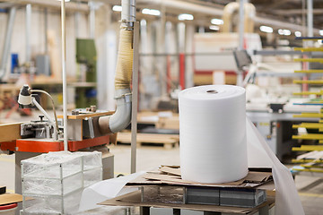 Image showing roll of foam wrap at woodworking factory workshop