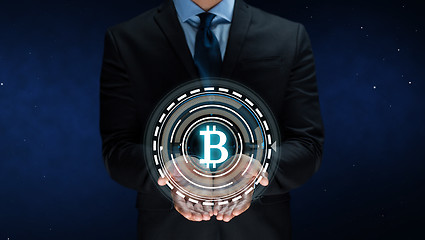 Image showing close up of businessman with bitcoin hologram