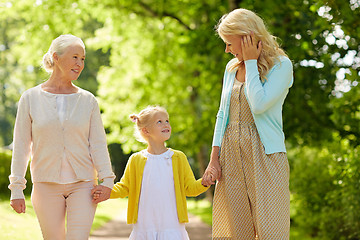 Image showing woman with daughter and senior mother at park