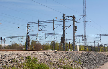 Image showing Overhead lines above train tracks in Helsinki