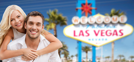 Image showing couple in shades over las vegas sign at summer