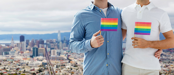 Image showing male couple with gay pride flags at san francisco