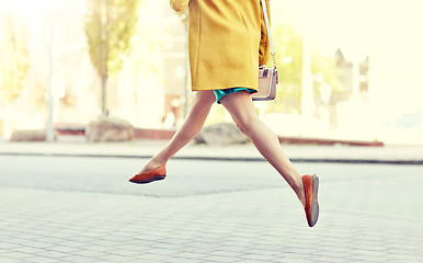 Image showing young woman or teenage girl legs on city street