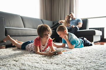 Image showing young couple spending time with kids