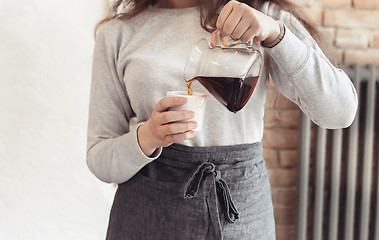 Image showing Barista, cafe, making coffee, preparation and service concept