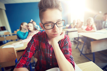 Image showing students gossiping behind classmate back at school