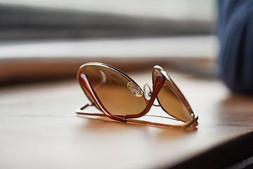 Image showing Sunglasses on a table