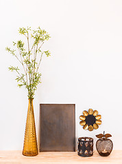 Image showing Home decor composition with tree branches and metal objects 