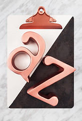 Image showing Stylish clipboard with metal rose gold letters